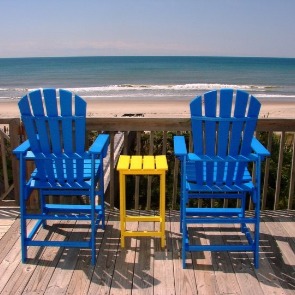 Two Adirondack chairs on an oceanfront deck  | Sun-Surf Emerald Isle Rentals
