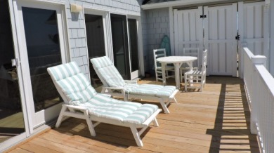 Lounge chairs on the deck of Vaya Con La Vista West | Sun-Surf Realty Emerald Isle Real Estate