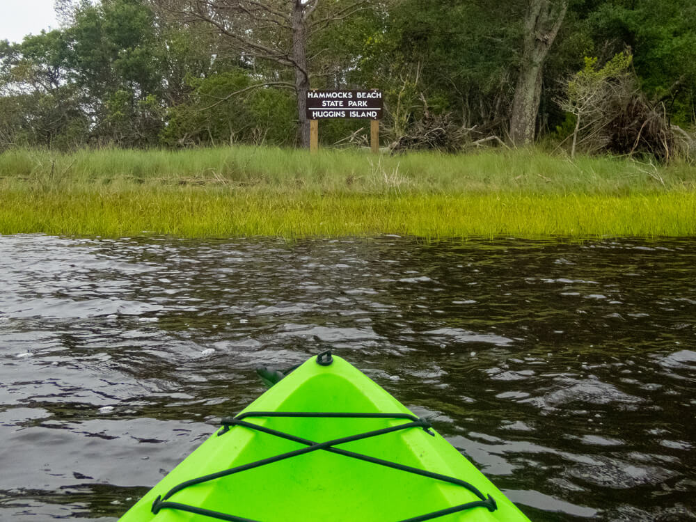 The view of Huggins Island from a kayak, one of the numerous things to do in Swansboro, NC.