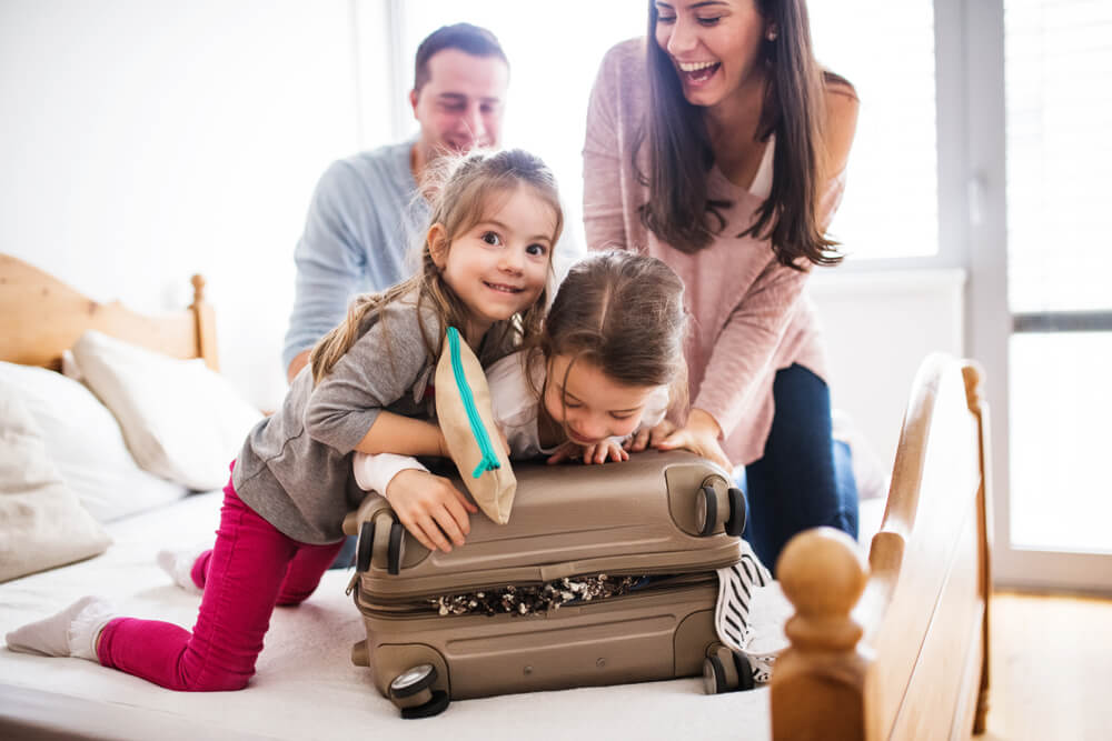 A family packing for their North Carolina vacation to Emerald Isle.