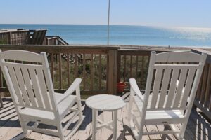 The deck of an Emerald Isle rental overlooking the beach.