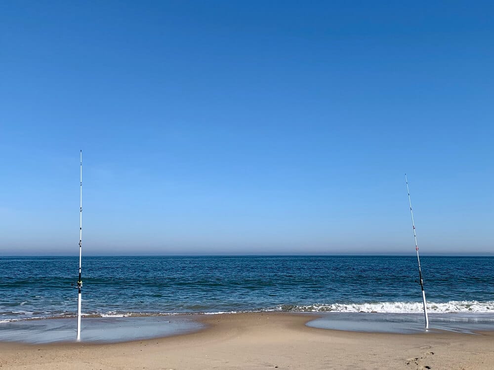 Fishing poles on an Emerald Isle beach.
