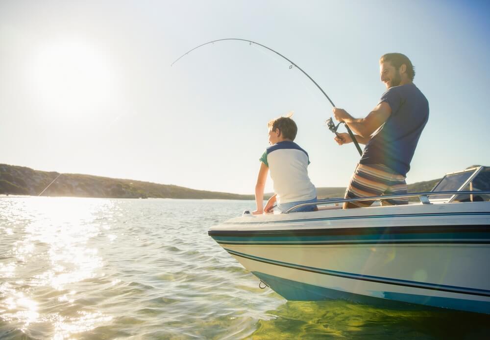 A father and son fishing in North Carolina.